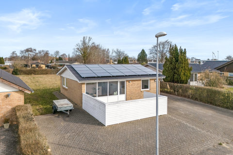 Familievenlig villa med moderne opdateringer i roligt kvarter